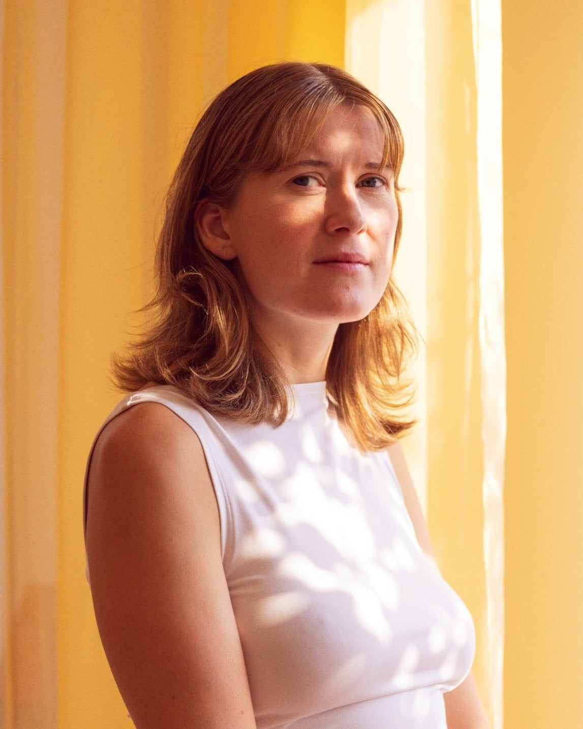 Clara filippa Damgaard andersen på hvid baggrund founder og ceo i peech