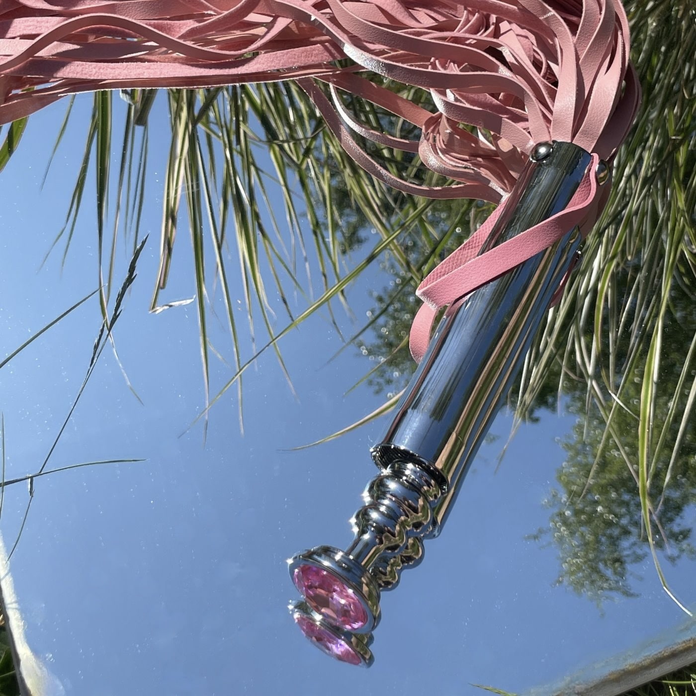 PINK FLOGGER MED MEDFØLGENDE BUTTPLUG