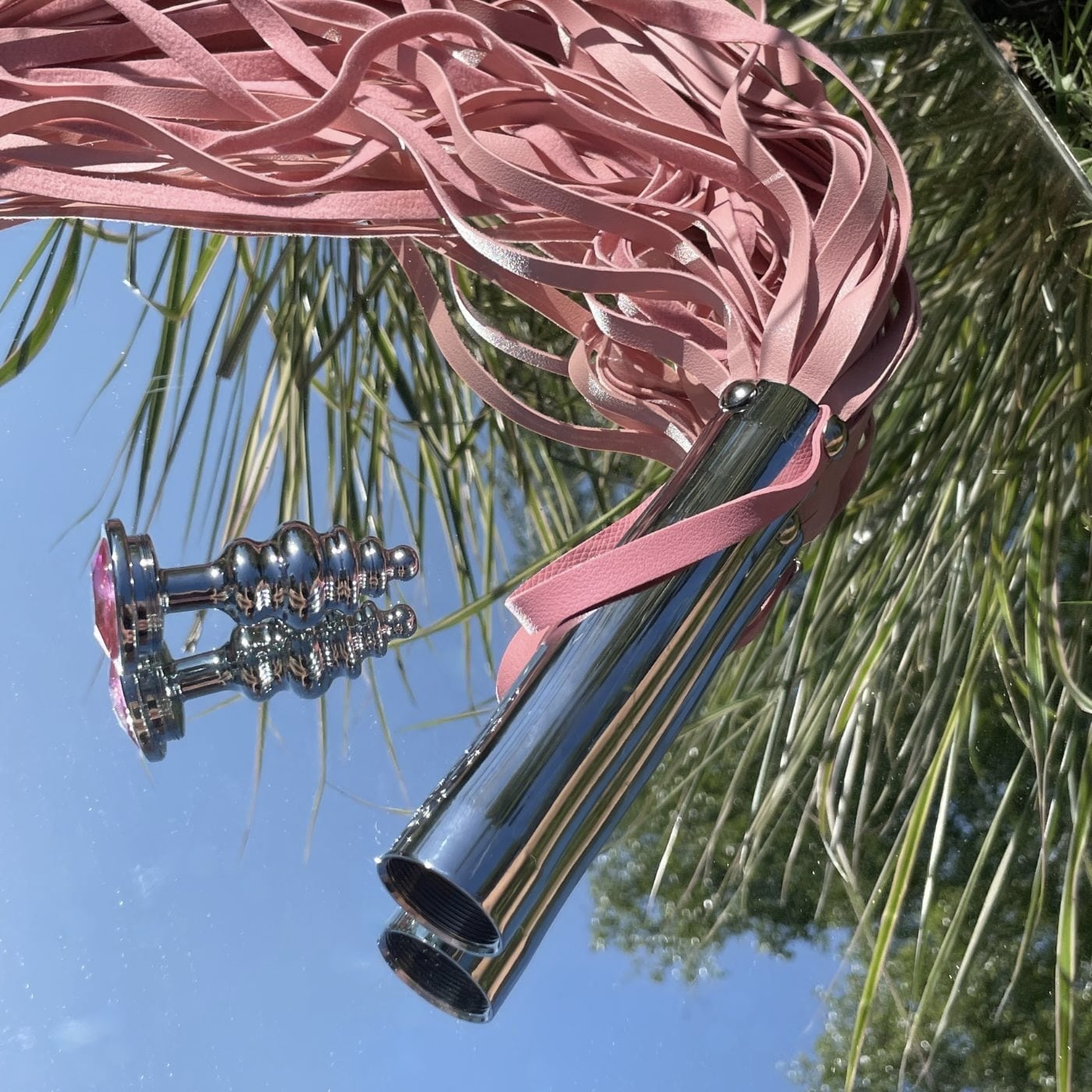 PINK FLOGGER MED MEDFØLGENDE BUTTPLUG
