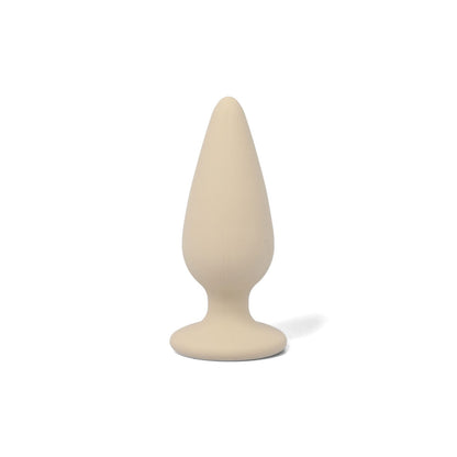 Pine buttplug i beige med stålkugler i